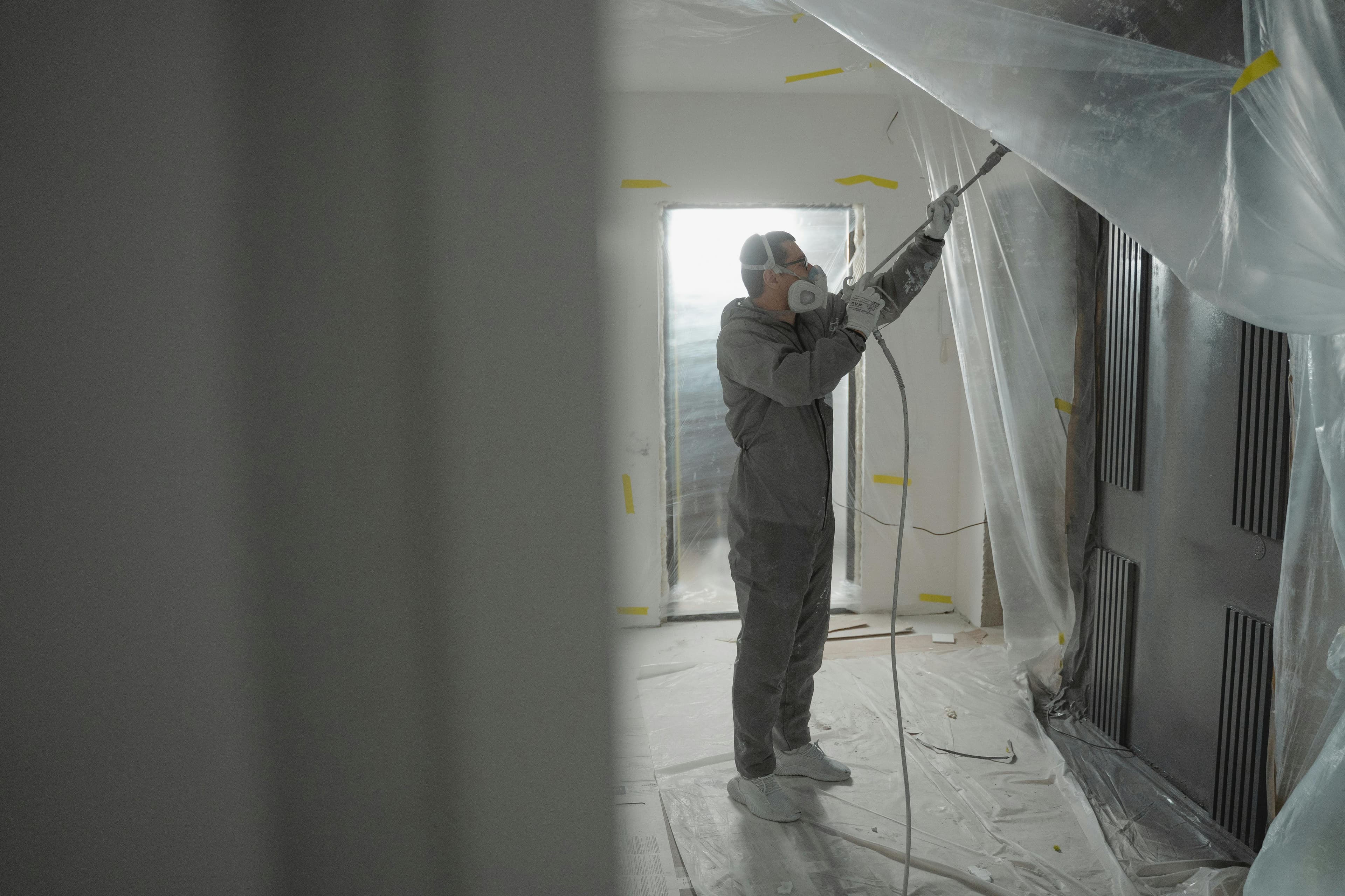 Professional spray painting interior in Maryland home